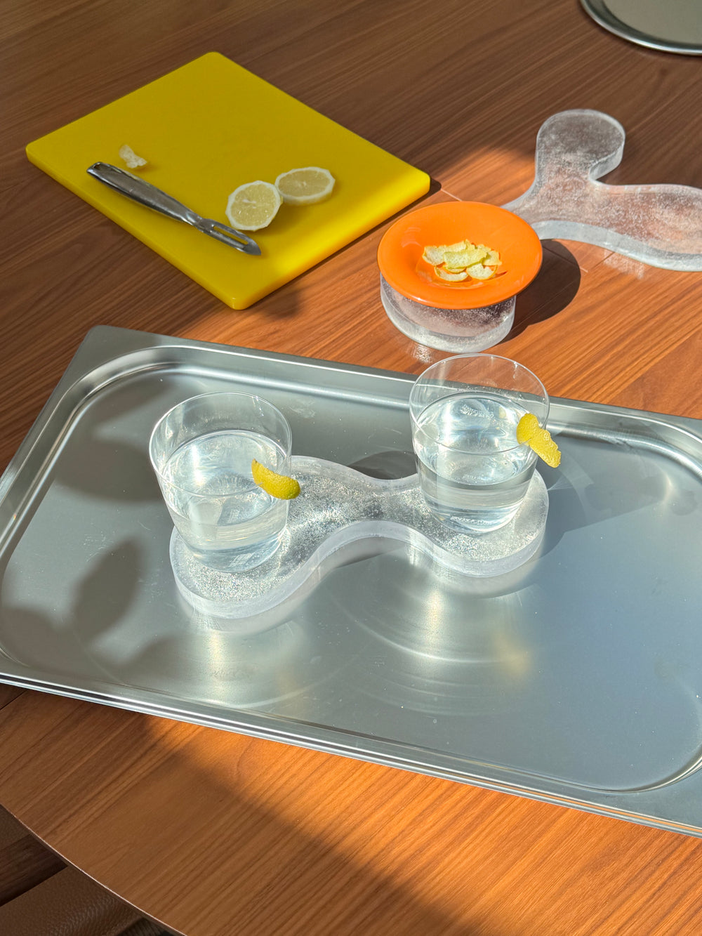 The 2 Drinks Coaster in clear recycled plastic