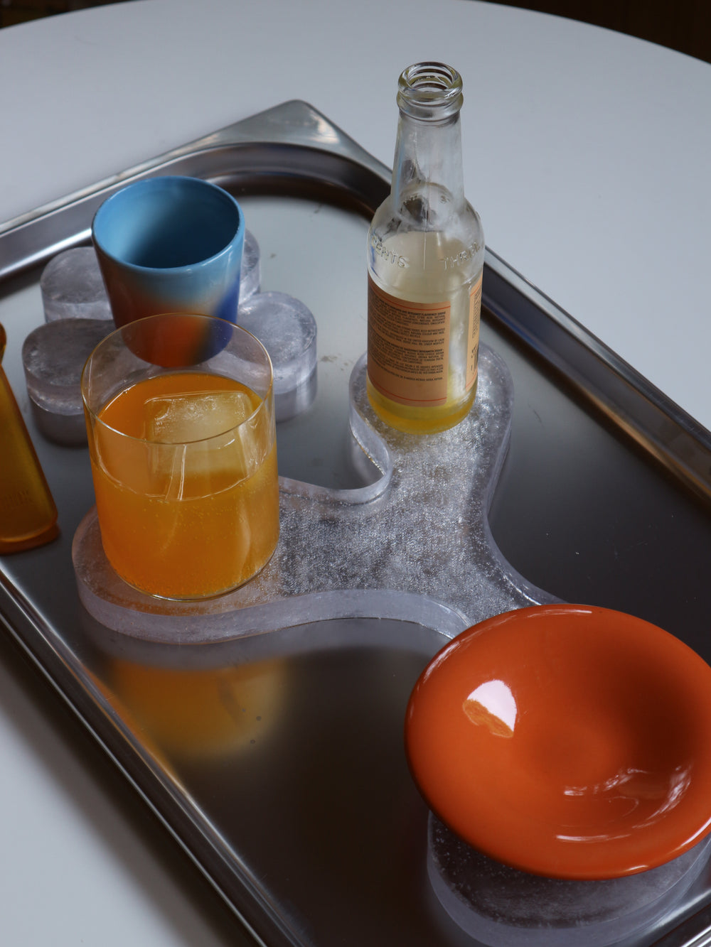 The 3 Drinks Coaster in clear recycled plastic